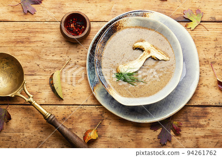 Classic mushroom puree soup in bowl 94261762