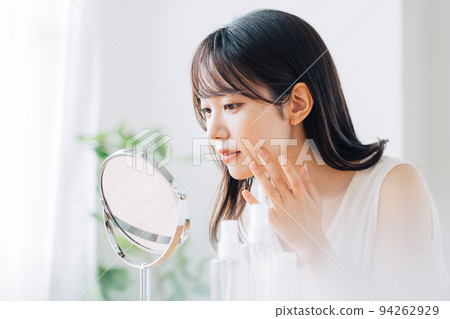 Woman checking your skin 94262929