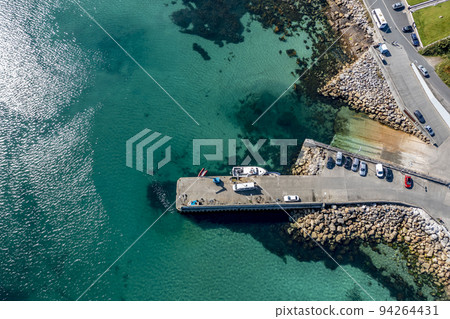 Aerial view of the pier at Leabgarrow on Arranmore Island in County Donegal, Republic of Ireland Aerial view of the pier at Leabgarrow on Arranmore Island in County Donegal, Republic of Ireland 94264431