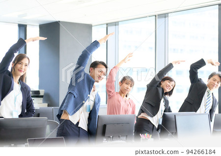 Business person stretching in the office 94266184