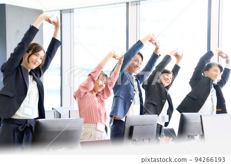 Business person stretching in the office 94266193