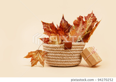 Fall Gift or Sale concept. Shopping. leaves basket, autumn decor. Fall Gift or Sale concept. Shopping. leaves basket, autumn decor. 94270252