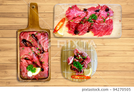 Top view of Big Set of striped calf beef prepare for grilled, focus selective 94270505