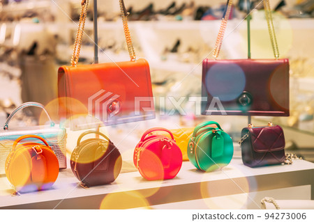 Fashion Accessories In Shop Window Showcase Of Store Mall Market Shelf With Fashion Bags In Store. Exquisite Designer Ladies Handbags. Closeup. Fashion Handbags In Shop Window Fashion Accessories In Shop Window Showcase Of Store Mall Market Shelf With Fashion Bags In Store. Exquisite Designer Ladies Handbags. Closeup. Fashion Handbags In Shop Window 94273006