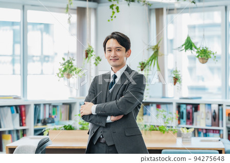 Business person standing in the office 94275648