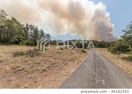 Forest fire wreaks havoc on causse de sauveterre. 94282503