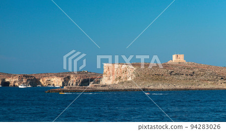 Summer landscape with St Mary Tower on rocky coast Summer landscape with St Mary Tower on rocky coast 94283026