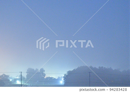 A foggy morning in Hakushu Town, Hokuto City. image of blue A foggy morning in Hakushu Town, Hokuto City. image of blue 94283428
