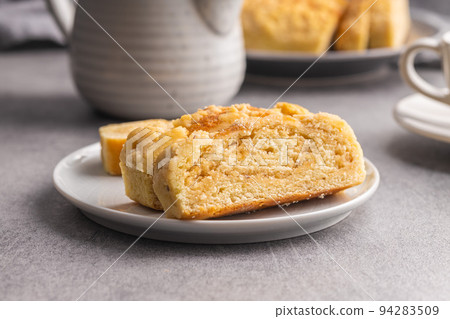 Sweet pie with nut flavor on plate. Sweet pie with nut flavor on plate. 94283509