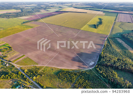 Drone view over summer agricultural fields landscape, Ukraine. 94283968