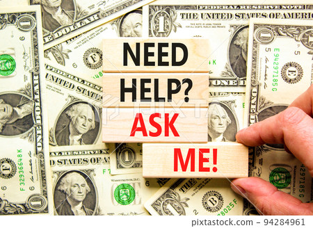 Support and need help ask me symbol. Concept words Need help ask me on wooden blocks on a beautiful background from dollar bills. Businessman hand. Business, support and Need help ask me concept. Support and need help ask me symbol. Concept words Need help ask me on wooden blocks on a beautiful background from dollar bills. Businessman hand. Business, support and Need help ask me concept. 94284961