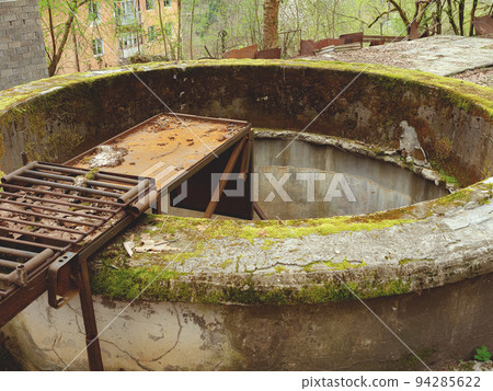 Ancient abandoned well. Ghost town. Abandoned fire well. Bandoned city. War torn place Ancient abandoned well. Ghost town. Abandoned fire well. Bandoned city. War torn place 94285622