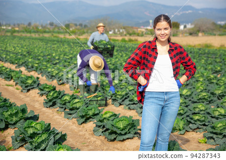 Portrait of successful female farmer on field Portrait of successful female farmer on field 94287343