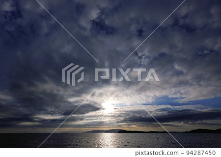 Coastal evening view in late summer with powerful clouds, super wide angle, mainly sky, 220907pm 94287450
