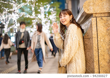 A woman waiting for a date A woman waiting for a date 94288827