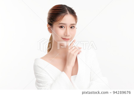 Beautiful young asian woman with clean fresh skin on white background, Face care, Facial treatment, Cosmetology, beauty and spa, Asian women portrait. Beautiful young asian woman with clean fresh skin on white background, Face care, Facial treatment, Cosmetology, beauty and spa, Asian women portrait. 94289676