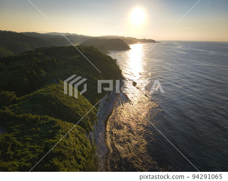 Beautiful sunset at Cape Rokkozaki, Suzu City, Ishikawa Prefecture (aerial photography by drone) 94291065