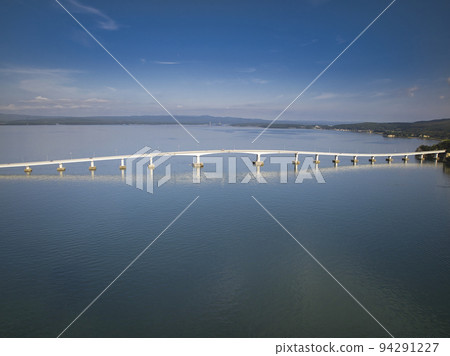 The majestic Noto Ohashi Bridge over Nanao Bay and the beautiful sea, Nanao City, Ishikawa Prefecture (Aerial shot by drone) The majestic Noto Ohashi Bridge over Nanao Bay and the beautiful sea, Nanao City, Ishikawa Prefecture (Aerial shot by drone) 94291227