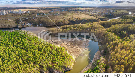 Confluence of the Iset and Kamenka rivers in the city Kamensk-Uralskiy. Iset and Kamenka rivers, Kamensk-Uralskiy, Sverdlovsk region, Ural mountains, Russia. Aerial view 94291571