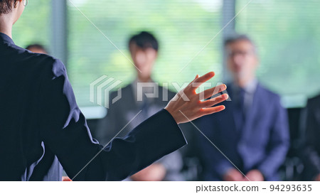 Women on stage and audience seminar presentation 94293635