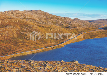 Beautiful lake at sunset. Wild nature Norway. Nordkapp, Mageroya island. Beautiful lake at sunset. Wild nature Norway. Nordkapp, Mageroya island. 94293960