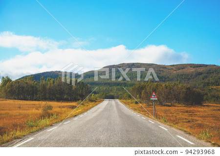 Driving a car on the road on the island of Senja, view from the windshield. Norway, Europe 94293968