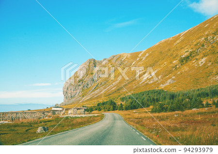 The road along the fjord. Lofoten islands, Norway, Europe The road along the fjord. Lofoten islands, Norway, Europe 94293979