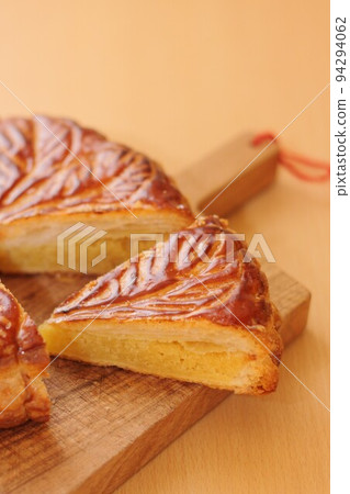 Festive food, traditional French confectionery "Galette des Rois" 94294062