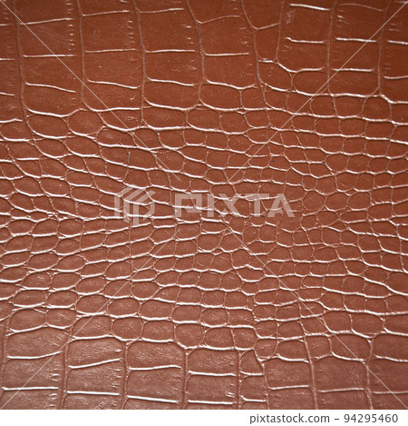 Very luxurious brown crocodile skin square texture used in textile industry 94295460