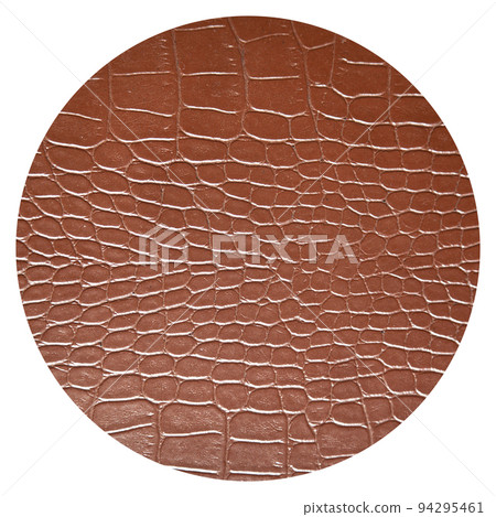 Very luxurious brown crocodile skin round texture used in textile industry 94295461
