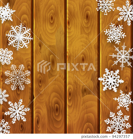 Christmas background with paper snowflakes on wooden planks Christmas background with paper snowflakes on wooden planks 94297357