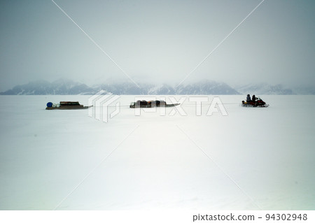 Snowmobile and Inuit 94302948