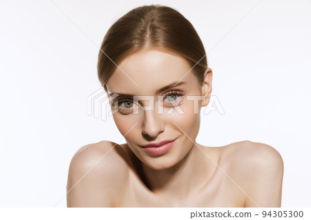 Portrait of young beautiful girl with well-kept skin and light daily makeup isolated on white background. Beauty, spa, cosmetics, face lifting and skin care concept Portrait of young beautiful girl with well-kept skin and light daily makeup isolated on white background. Beauty, spa, cosmetics, face lifting and skin care concept 94305300