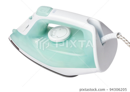 Smoothing iron isolated on white background. Clothes iron in the horizontal position. An electric iron ready to be cut out of the background. 94306205