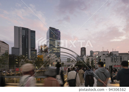Shibuya's redeveloped Miyashita Park Evening view of the rooftop plaza bustling with young people Shibuya Ward, Tokyo 94306382