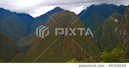 Panoramic view to Machu Picchu archaeological site and Huayna Picchu mountain , Cuzco, Peru Panoramic view to Machu Picchu archaeological site and Huayna Picchu mountain , Cuzco, Peru 94308048
