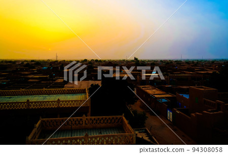 Aerial sunset panoramic view to Agadez old city, Air, Niger 94308058