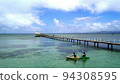 pier and kayaks 94308595