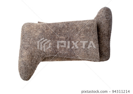Top view of a pair of felt boots isolated on a white background. 94311214
