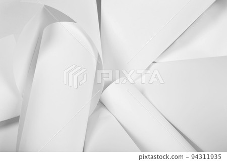 White sheets of office paper are twisted and scattered. Paper white abstract background. White sheets of office paper are twisted and scattered. Paper white abstract background. 94311935