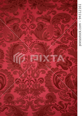 An old pattern on tapestry fabric.Vintage retro background red. An old pattern on tapestry fabric.Vintage retro background red. 94312161