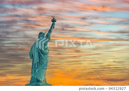 Liberty Statue New york city usa at sunset Liberty Statue New york city usa at sunset 94312927