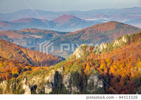Ridges of hills in autumn colors. Ridges of hills in autumn colors. 94313326