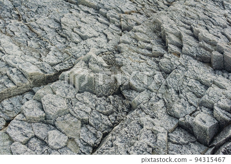 natural background, rock texture from weathered columnar basalt natural background, rock texture from weathered columnar basalt 94315467
