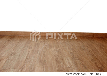 Laminate wood floor with blank white wall 94318315