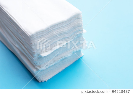 Facial tissue on blue background. Facial tissue on blue background. 94318487