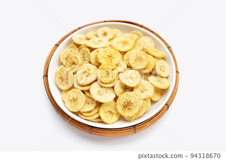 Banana slice chips on white background. 94318670