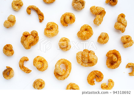 Crispy pork rinds or pork snack. 94318692