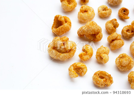 Crispy pork rinds or pork snack. 94318693