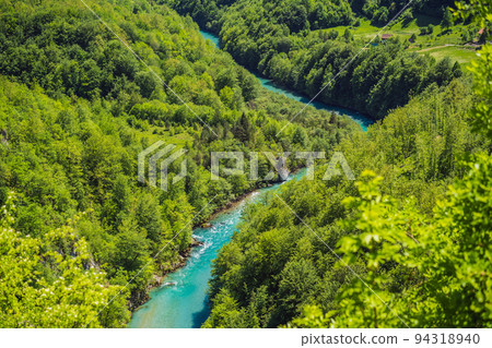 Montenegro natural landscape, mountain river Tara Portrait of a disgruntled girl sitting at a cafe table 94318940